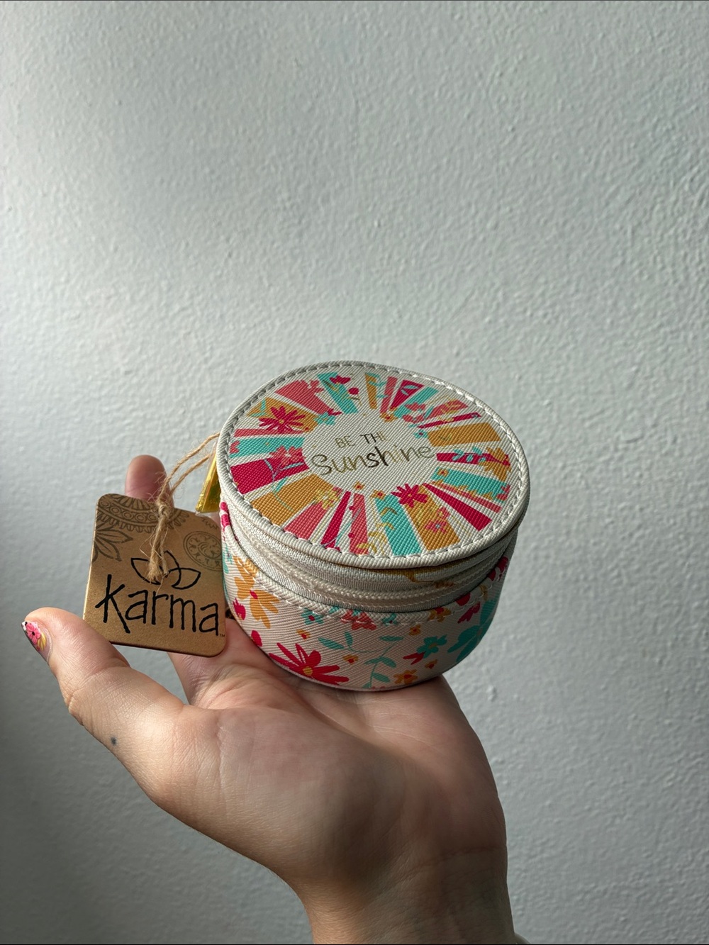 Karma Floral Round Cosmetic Pouch in White with Pink, Turquoise & Yellow Accents